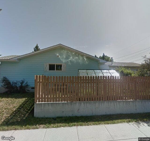 Street view of 11 Queen Isabella Close SE, Calgary