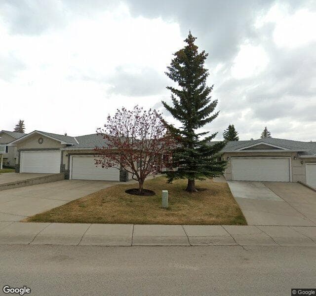 Street view of 310 Arbour Cliff Close NW, Calgary