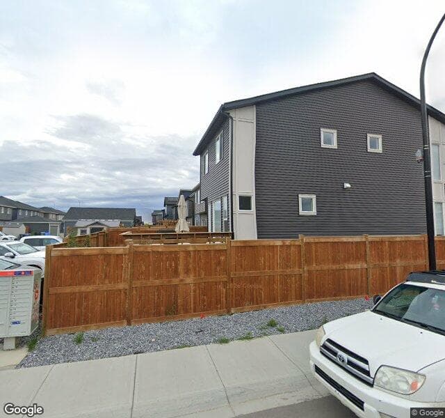 Street view of 316 Wolf Creek Manor SE, Calgary