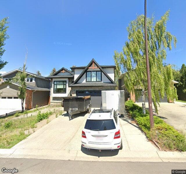 Street view of 51 Coach Ridge Place SW, Calgary