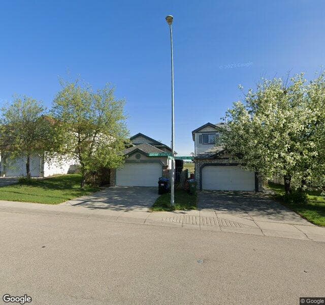 Street view of 202 Hidden Spring Mews NW, Calgary