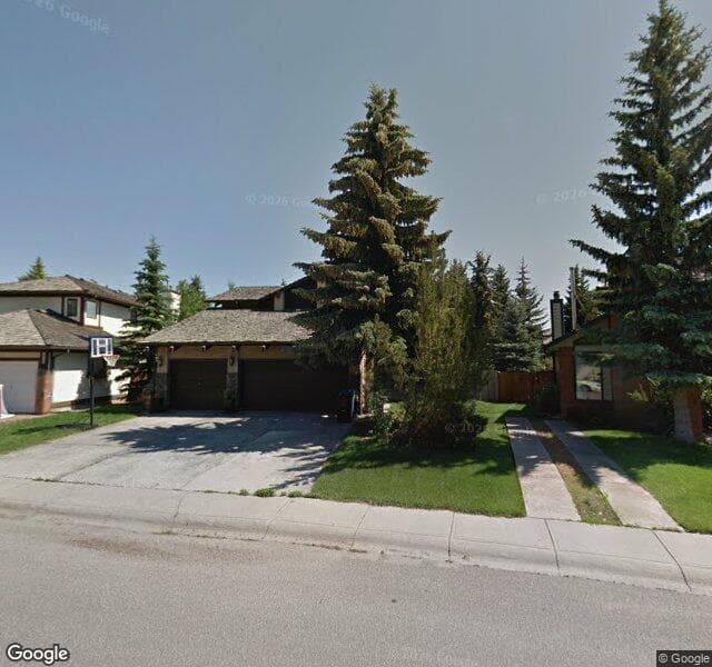 Street view of 11 Woodacres Crescent SW, Calgary