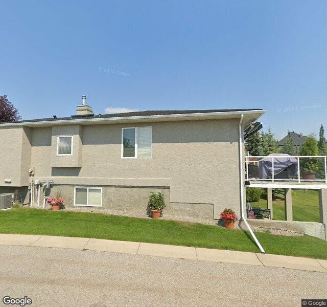 Street view of 32 Elysian Crescent SW, Calgary