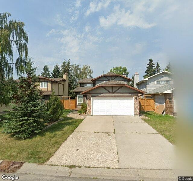 Street view of 115 Woodmont Drive SW, Calgary