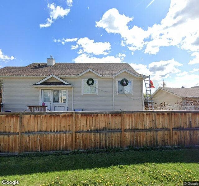 Street view of 305 Somerside Close SW, Calgary