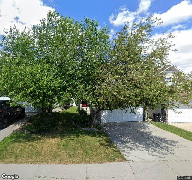 Street view of 142 Hidden Hills Terrace NW, Calgary