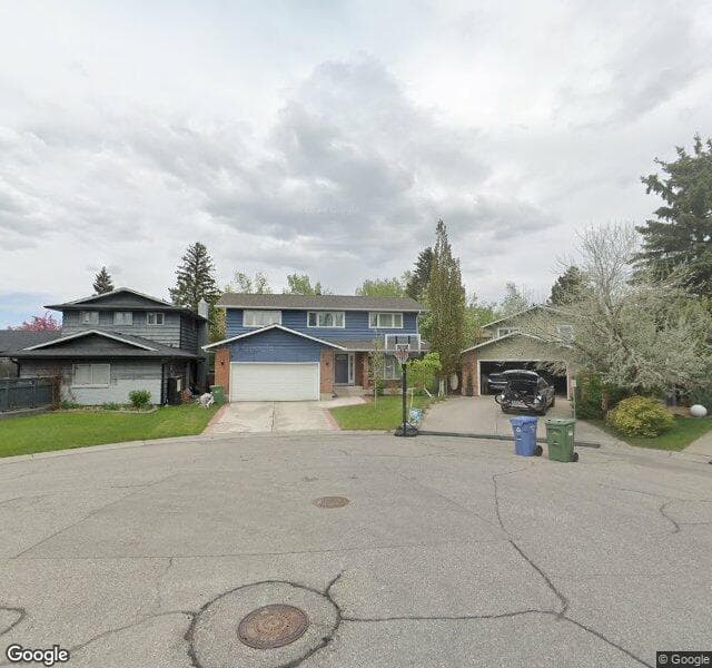 Street view of 124 Deer Side Place SE, Calgary