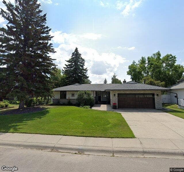 Street view of 10719 Willowgreen Drive SE, Calgary