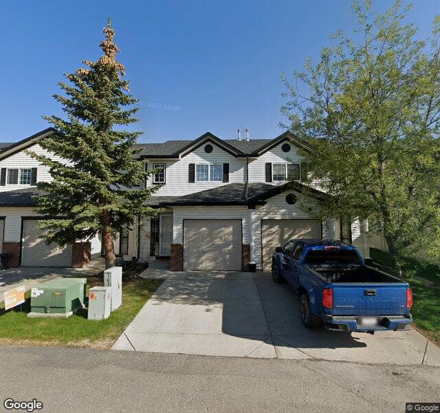 Street view of 212 Country Village Cape NE, Calgary