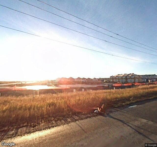 Street view of 346 Saddlebrook Point NE, Calgary