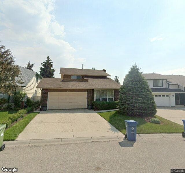 Street view of 248 Woodfield Place SW, Calgary