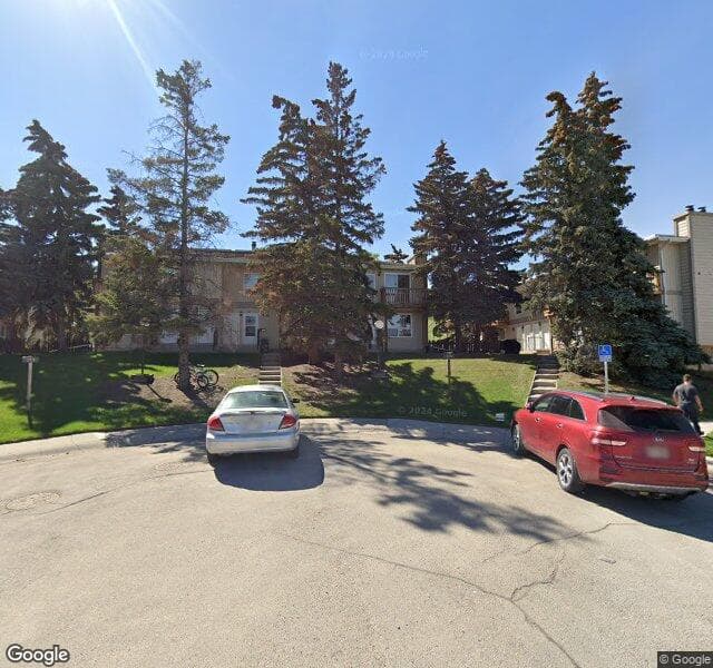 Street view of 302-219 Huntington Park Bay NW, Calgary