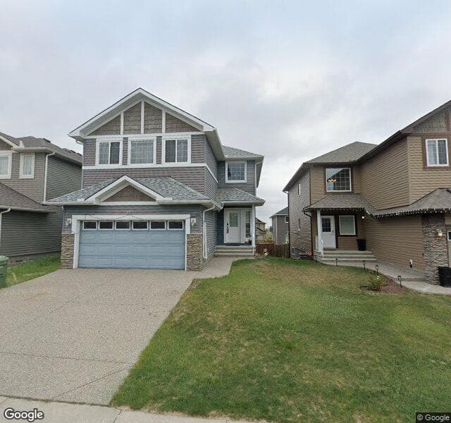 Street view of 112 Everhollow Rise SW, Calgary