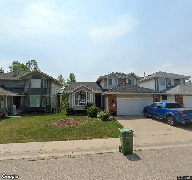 Street view of 61 Woodford Close SW, Calgary