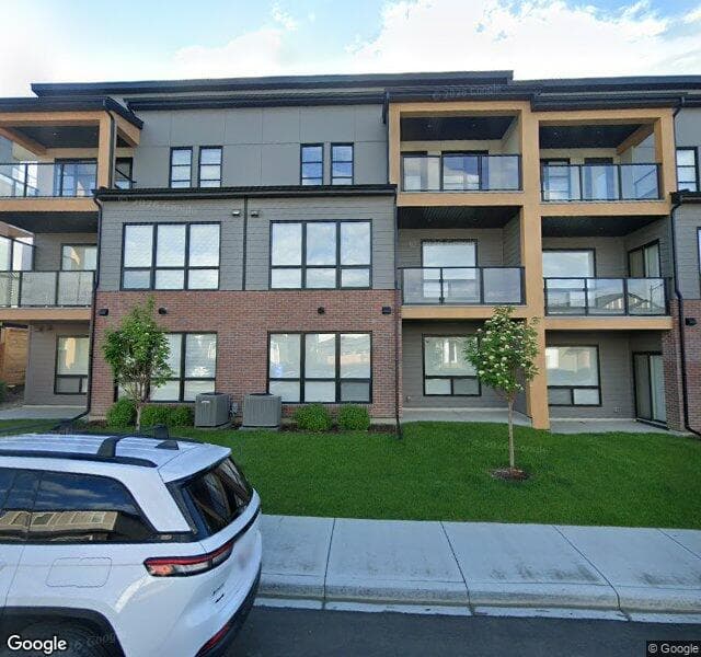 Street view of 252-7820 Spring Willow Drive SW, Calgary