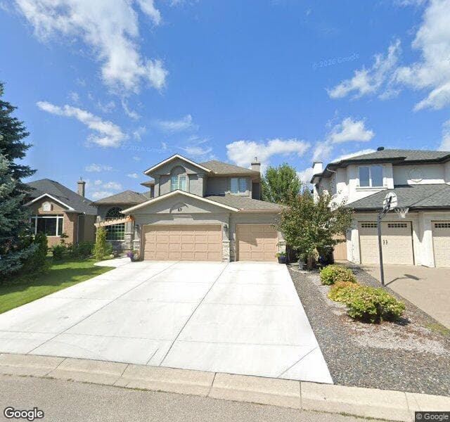 Street view of 67 Sunset Way SE, Calgary