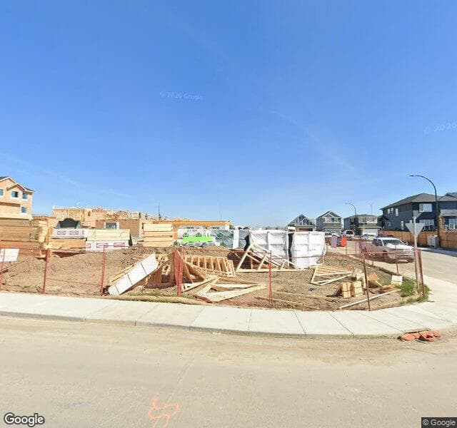 Street view of 34 Creekside Avenue SW, Calgary