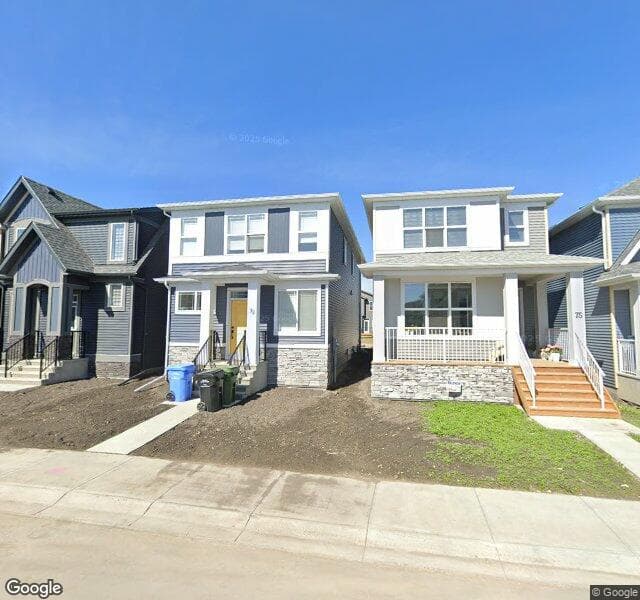 Street view of 79 Creekside Manor SW, Calgary