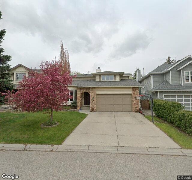 Street view of 68 Sunrise Crescent SE, Calgary