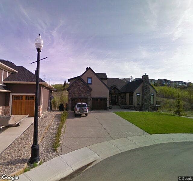 Street view of 84 Discovery Valley Cove SW, Calgary