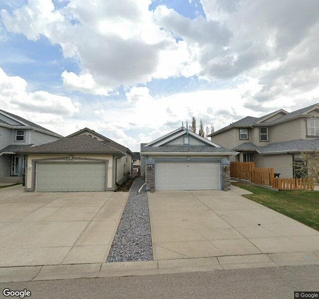 Street view of 128 Covehaven Gardens NE, Calgary