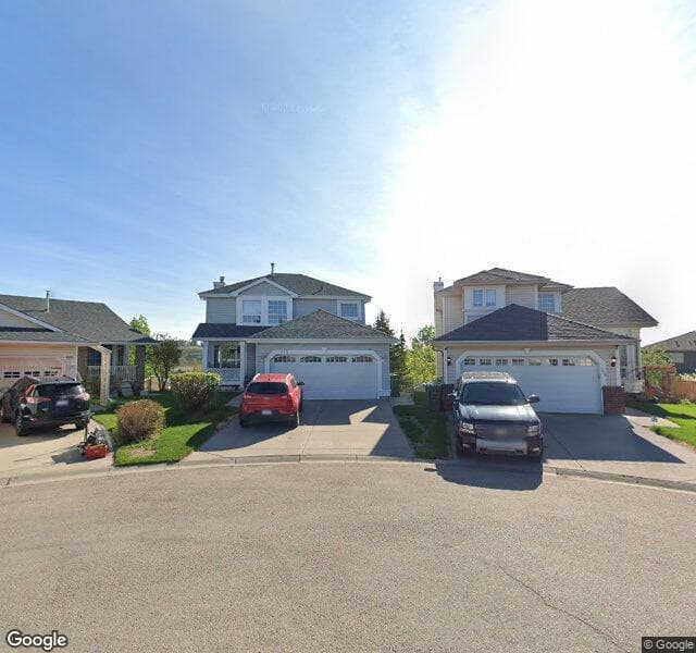 Street view of 122 Hidden Vale Place NW, Calgary