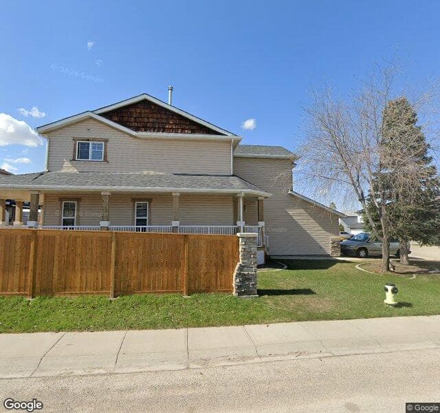 Street view of 310 Panamount Drive NW, Calgary