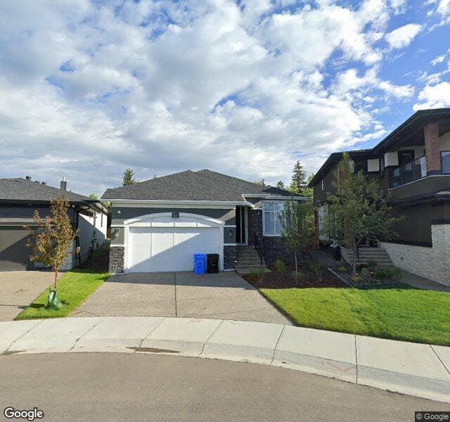 Street view of 82 Aspen Summit Close SW, Calgary