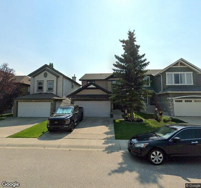 Street view of 38 Cougarstone Park SW, Calgary