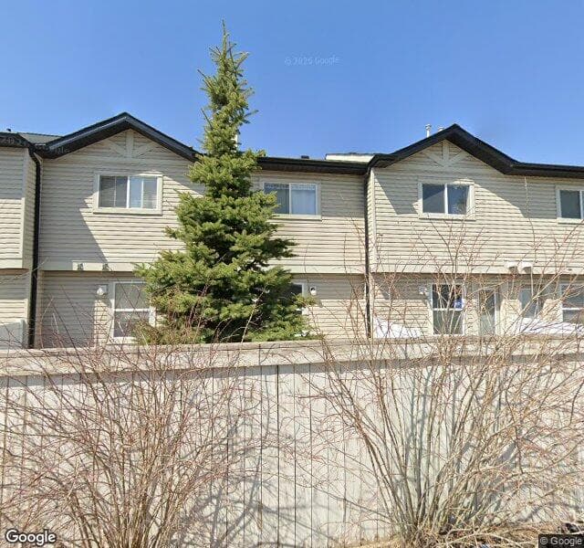 Street view of 261 Saddlebrook Point NE, Calgary