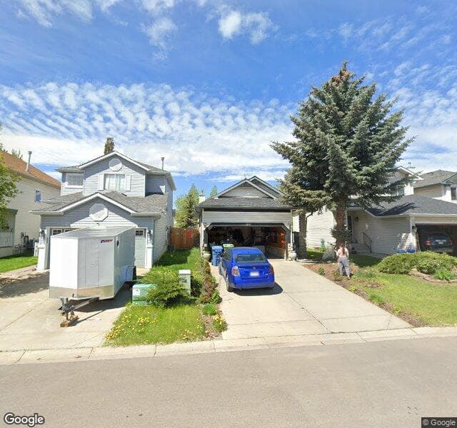 Street view of 100 Mount Apex Crescent SE, Calgary