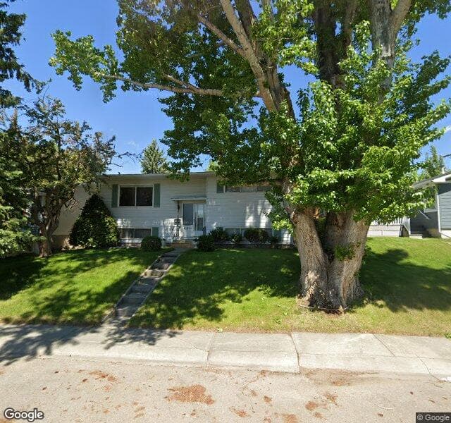 Street view of 6211 Lewis Drive SW, Calgary