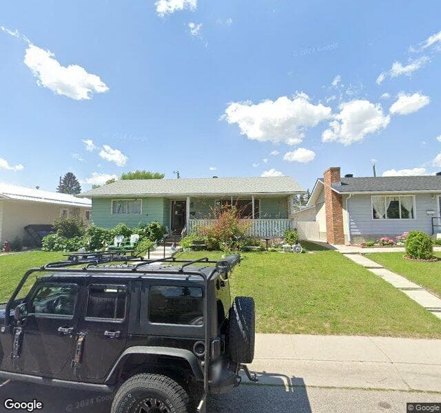 Street view of 911 Penmeadows Road SE, Calgary