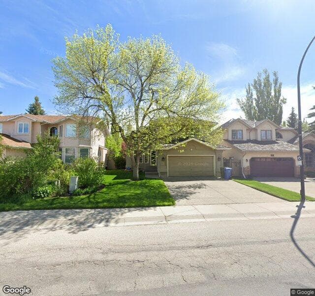 Street view of 16024 Mckenzie Lake Way SE, Calgary