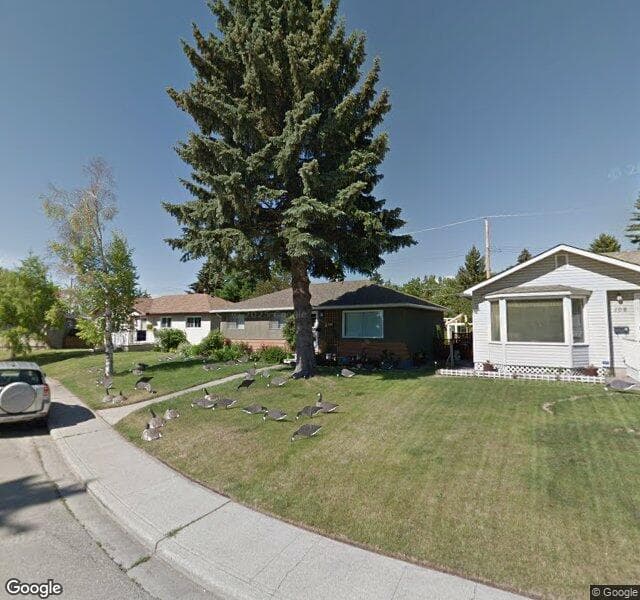 Street view of 104 Glacier Drive SW, Calgary