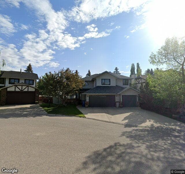 Street view of 216 Hawkview Manor Place NW, Calgary