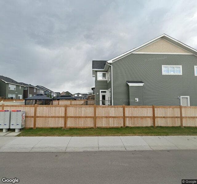 Street view of 33 Evansfield Manor NW, Calgary