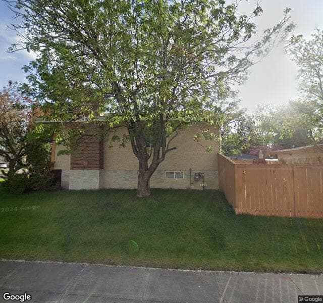 Street view of 162 Oakmoor Place SW, Calgary