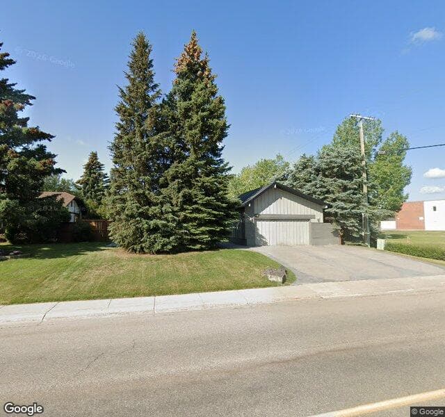 Street view of 2232 Lake Bonavista Drive SE, Calgary