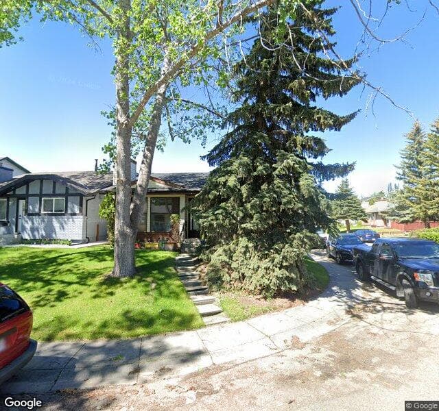 Street view of 135 Woodglen Close SW, Calgary