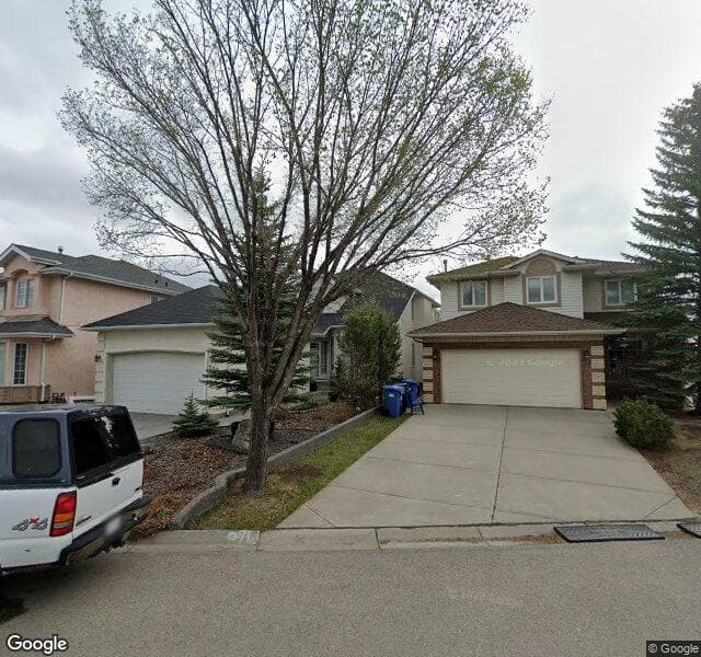 Street view of 213 Hidden Circle NW, Calgary