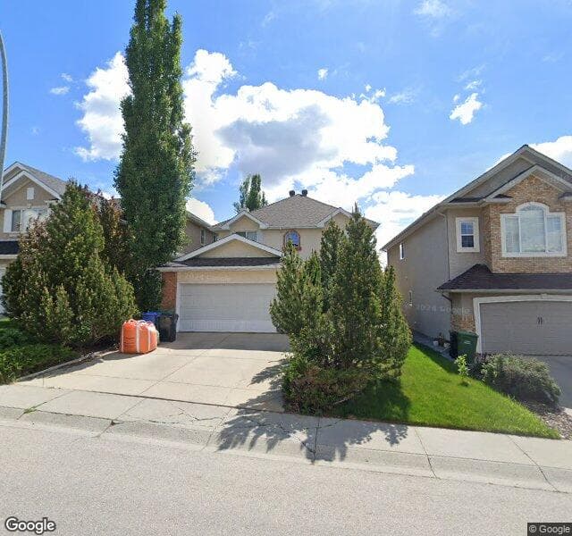 Street view of 210 Tuscany Ridge Park NW, Calgary