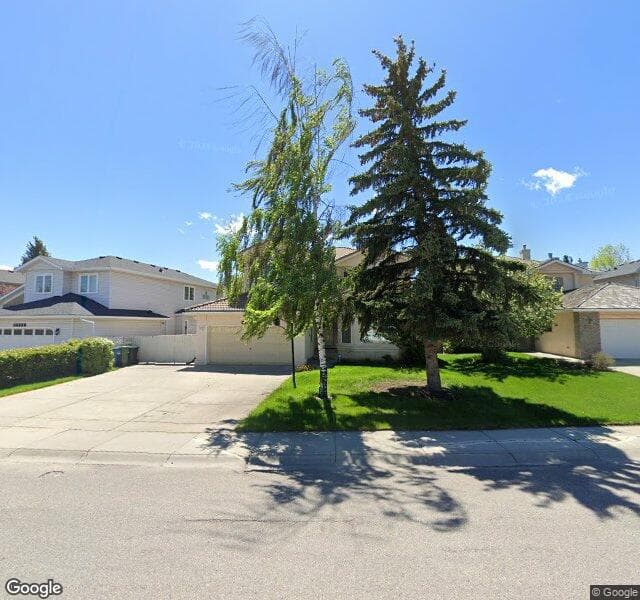 Street view of 2115 Woodpark Avenue SW, Calgary