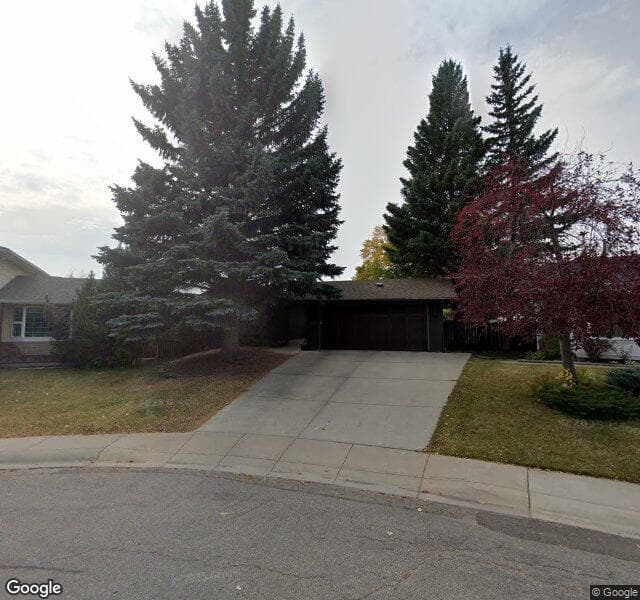 Street view of 120 Lake Crimson Close SE, Calgary