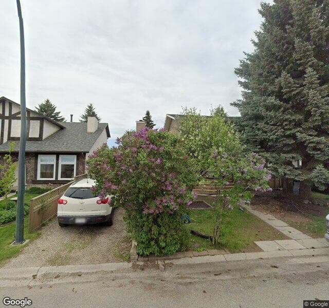 Street view of 75 Deer Lane Close SE, Calgary