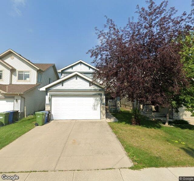 Street view of 11 Cougarstone Way SW, Calgary