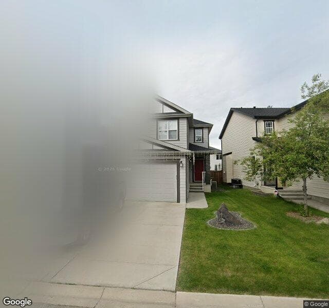 Street view of 52 Copperpond Terrace SE, Calgary