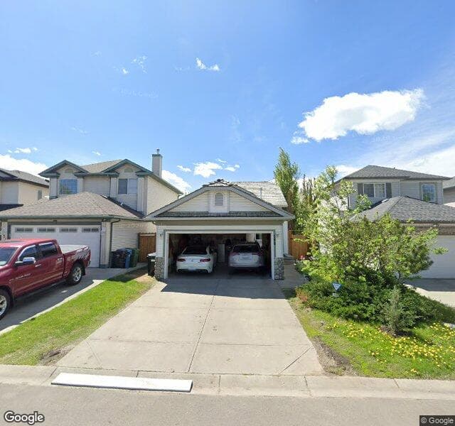 Street view of 158 Mount Apex Crescent SE, Calgary