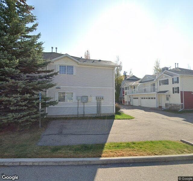 Street view of 502 Country Village Cape NE, Calgary