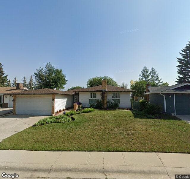 Street view of 9851 Oakhill Drive SW, Calgary